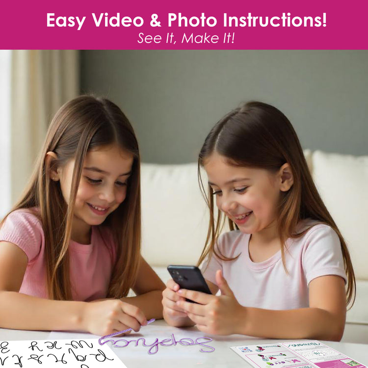 Two smiling girls using mobile video instructions to follow Chalk and Chuckles 7 Days of Arts & Crafts DIY kit with letter templates and crafting supplies on table
