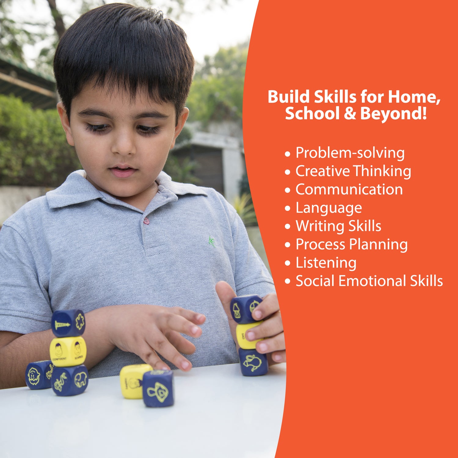 Child stacking and playing with Rolling Tales storytelling dice game to build problem-solving, writing, and social emotional skills at home or school